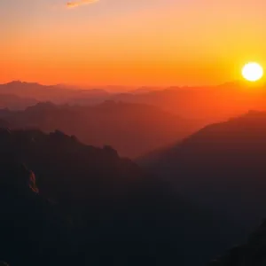 TAPETA Zachód słońca w górach