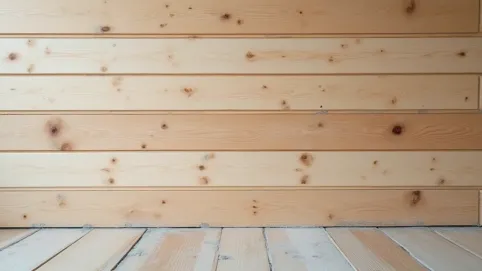 Układanie płytek na drewnianej ścianie