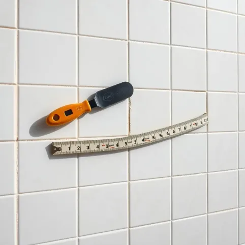 Układanie płytek na ścianie cena