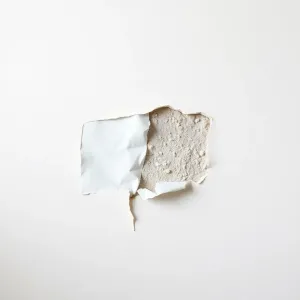 zerwany papier z płyty gk